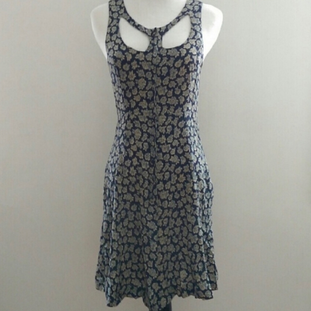Reformation floral dress with cut out detail.